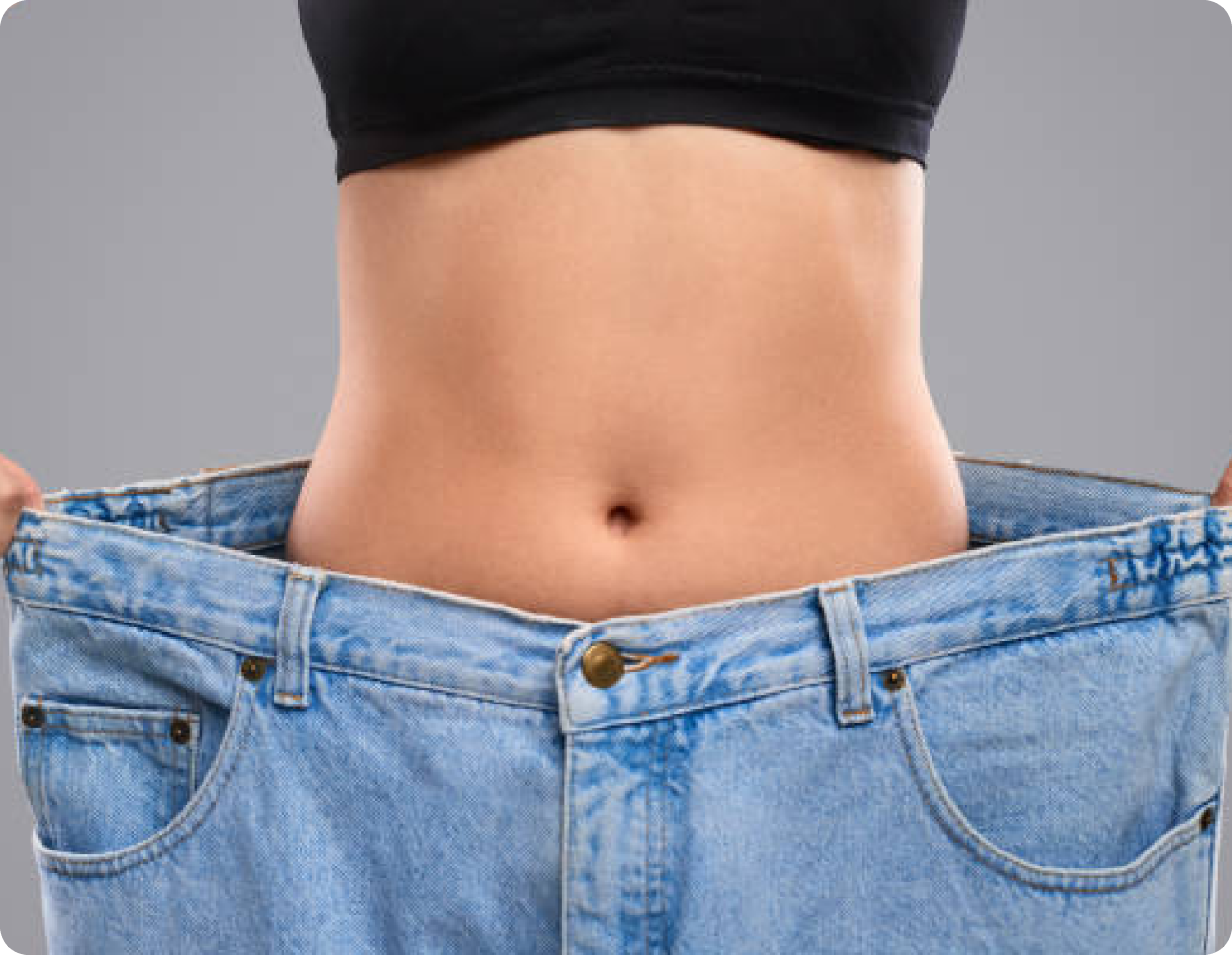 Weight loss transformation with oversized pants