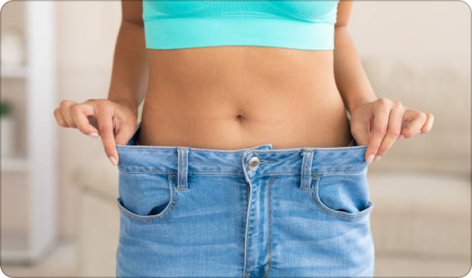 Weight loss transformation with oversized pants